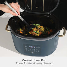 6QT programmable slow cooker in slate blue with food inside and front control panel