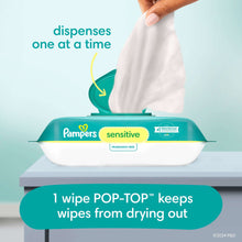 Sensitive wipes pack dispensing one wipe at a time, white wipe lifted