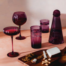 Magenta sphere drinking glasses with rounded bases and thick walls, set of 4