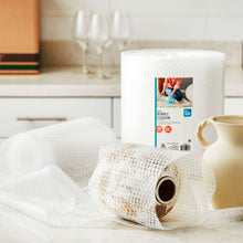 White small-bubble wrap roll, visible bubble texture for cushioning