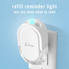 White Febreze PLUG warmer with a refill reminder light and clear refill reservoir