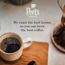 Peet's Coffee cup filled with dark brewed coffee