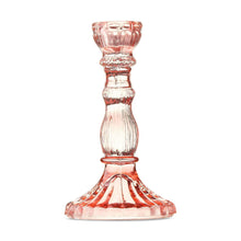 Pink glass taper candle holder with fluted neck and wide flared base