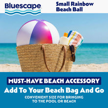 Rainbow inflatable beach ball resting in a woven beach bag; visible purple valve.