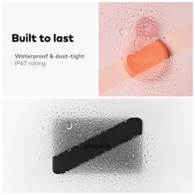 Round and card Bluetooth trackers shown in water droplets