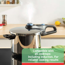 Stainless steel pressure cooker with side handles and domed lid