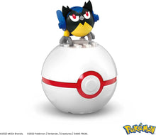 Rookidee action figure standing on white Poké Ball building toy