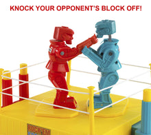 Red and blue fighting robots facing off on a yellow arena game board