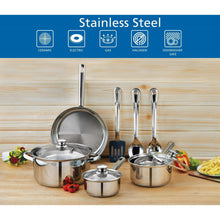 Stainless steel cookware set with multiple pots and utensils on a countertop