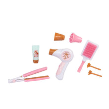 Plastic hair styling tools set with pink hairdryer, brush, combs and small accessories
