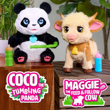 Cream and brown plush cow with pink ears, yellow nose bell, beside a blue bottle