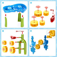 Kids dinosaur sand and water table parts view with blue basin and green support tubes