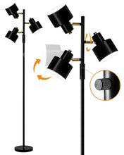 Black 3-light floor lamp with adjustable heads and gold connectors on poles