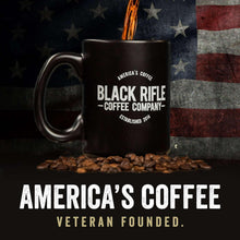 Black Rifle Coffee Company branded coffee mug filled with hot coffee