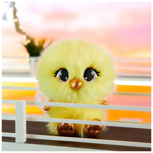 Yellow chick plush stuffed animal with tufted fur and orange feet