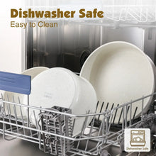 White speckled pots and lids in a dishwasher rack, ready for cleaning