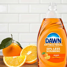 Antibacterial orange hand soap bottle with citrus fruit and “50% less scrubbing” label