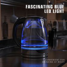 Electric glass kettle with blue LED light ring on stainless steel base