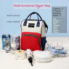Blue and red diaper backpack with open top and side storage for baby items