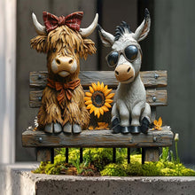 Acrylic cow and donkey flower pot planter with bow ties, sunglasses, and sunflower centerpiece