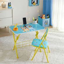 Kids activity desk with turquoise tabletop, yellow chair, and under-table storage rack
