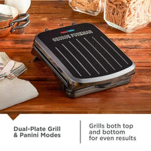 George Foreman indoor grill with lid closed, ridged plates for panini-style pressing