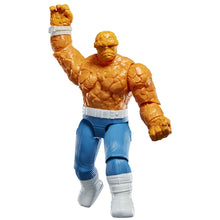 Marvel The Thing action figure, orange rocky torso, blue pants, white boots, raised arm