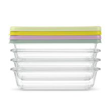 Clear glass meal prep containers stacked with lime, purple, and mint lids