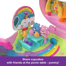 Colorful picnic table playset with bear and friend dolls in a compact