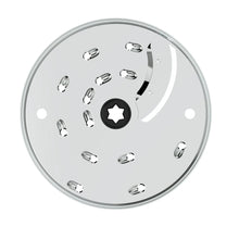 Food processor slicing disc with star-shaped center and blade slots