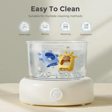 Blue and yellow silicone wrist teethers inside a countertop sterilizer