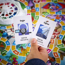 Two job cards in hand for a board game: Logger and Engineer