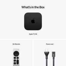 Apple TV 4K streaming box with Siri remote shown with box contents