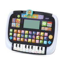 White and black light-up learning tablet with blank screen, keyboard keys, vtech