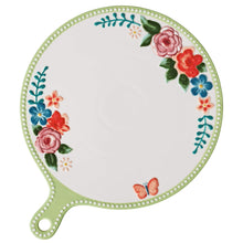 Mint green oval ceramic serving board with floral rim, cutout handle, multicolor blossoms