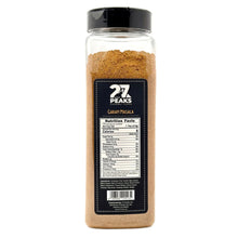 Garam masala spice bottle, clear jar with black cap and nutrition facts panel
