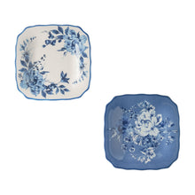 Two blue stoneware appetizer plates with wreath and bouquet floral patterns