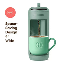 Keurig K-Mini Mate pod coffee maker in Glamping Green, compact front view with cup