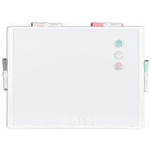 Dry erase whiteboard with plastic frame, blank surface with pastel magnets and markers
