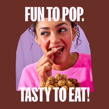 Chocolate chip granola minis snack bites with chocolate chips, person eating a bite.