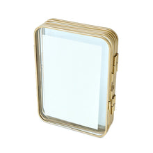 Gold metal folding picture frame with hinged clear glass and single front panel