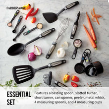 Black kitchen tool set laid out with cooking utensils and measuring cups