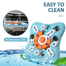 Blue treat puzzle feeder with orange spinner center and bone-shaped sliding pieces
