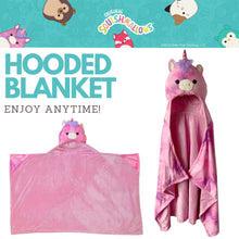 Pink plush hooded throw blanket with unicorn-like hood and poncho-style drape