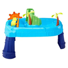 Blue water table toy with green slide, orange spinner, and two palm tree spouts