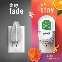 White Febreze plug-in air freshener oil refill with digital scent control display