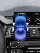 Bracketron AutoGrip universal vent phone mount holding a phone on the dashboard vent