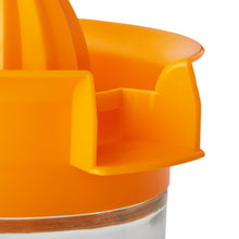Orange plastic citrus juicer body with glass juice cup and side handle