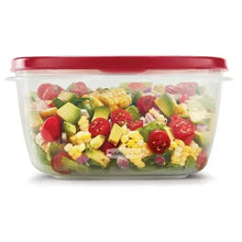 Clear plastic food container with red lid filled with chopped vegetables