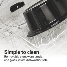 Removable stoneware crock and glass lid on a dishwasher rack.